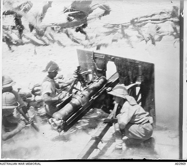 Members of the 11th Mountain Battery in action using a light field 3.7-inch mountain howitzer. August 1918 Palestine West Bank Abu Tellul. Glass stereo negative Accession Number A02969. . Public Domain