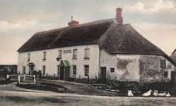 The Red Lion at Winfrith (early 20th Century Postcard) This was one of three pubs that Thomas Hardy amalgamated into “The Quiet Woman” in The Return of the Native.