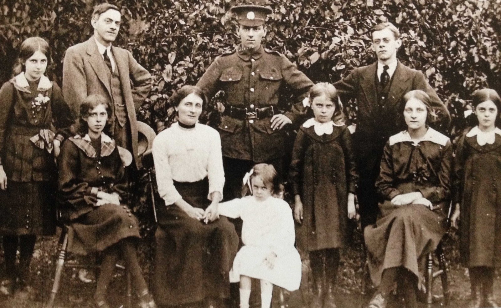Leonard and Emma Weekley with their family Herbert standing centre in his new uniform with brother Leonard Percy on his left