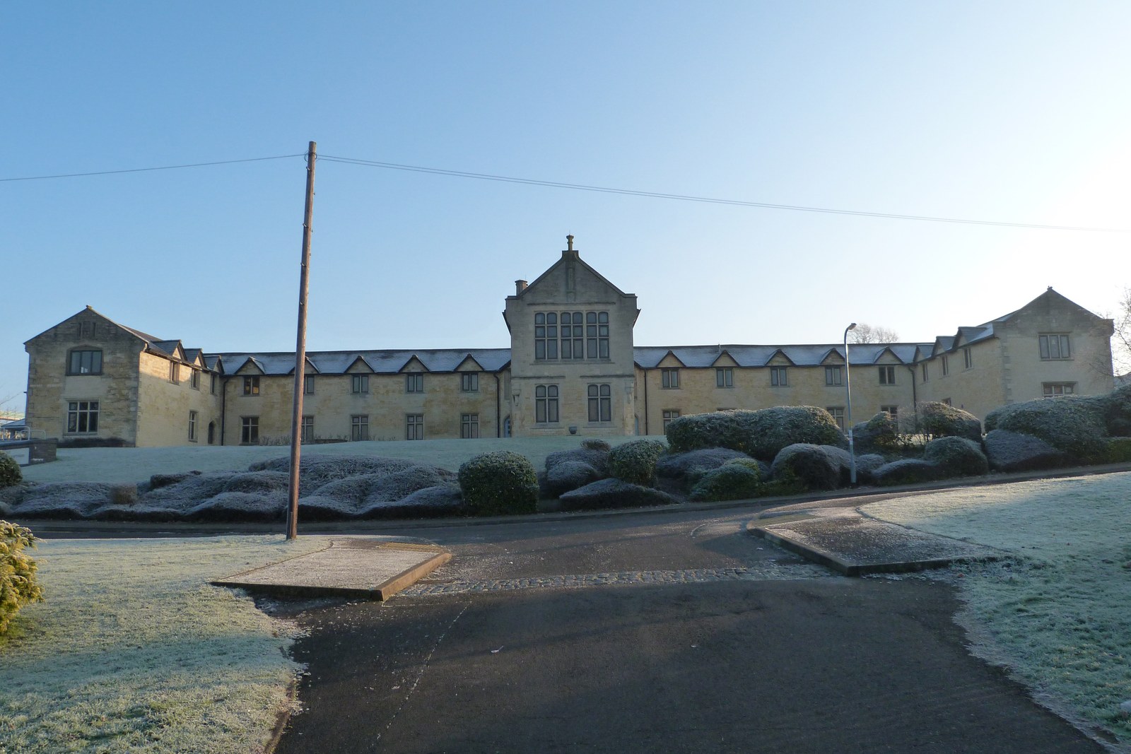 Workhouse buildings on a frosty morning 13th December 2012 (Now East Northamptonshire District Council Offices.) The perimeter wall and gates have gone but otherwise looks very similar to George Clarke’s 1847 sketch. Now, however, surrounded by a housing estate.