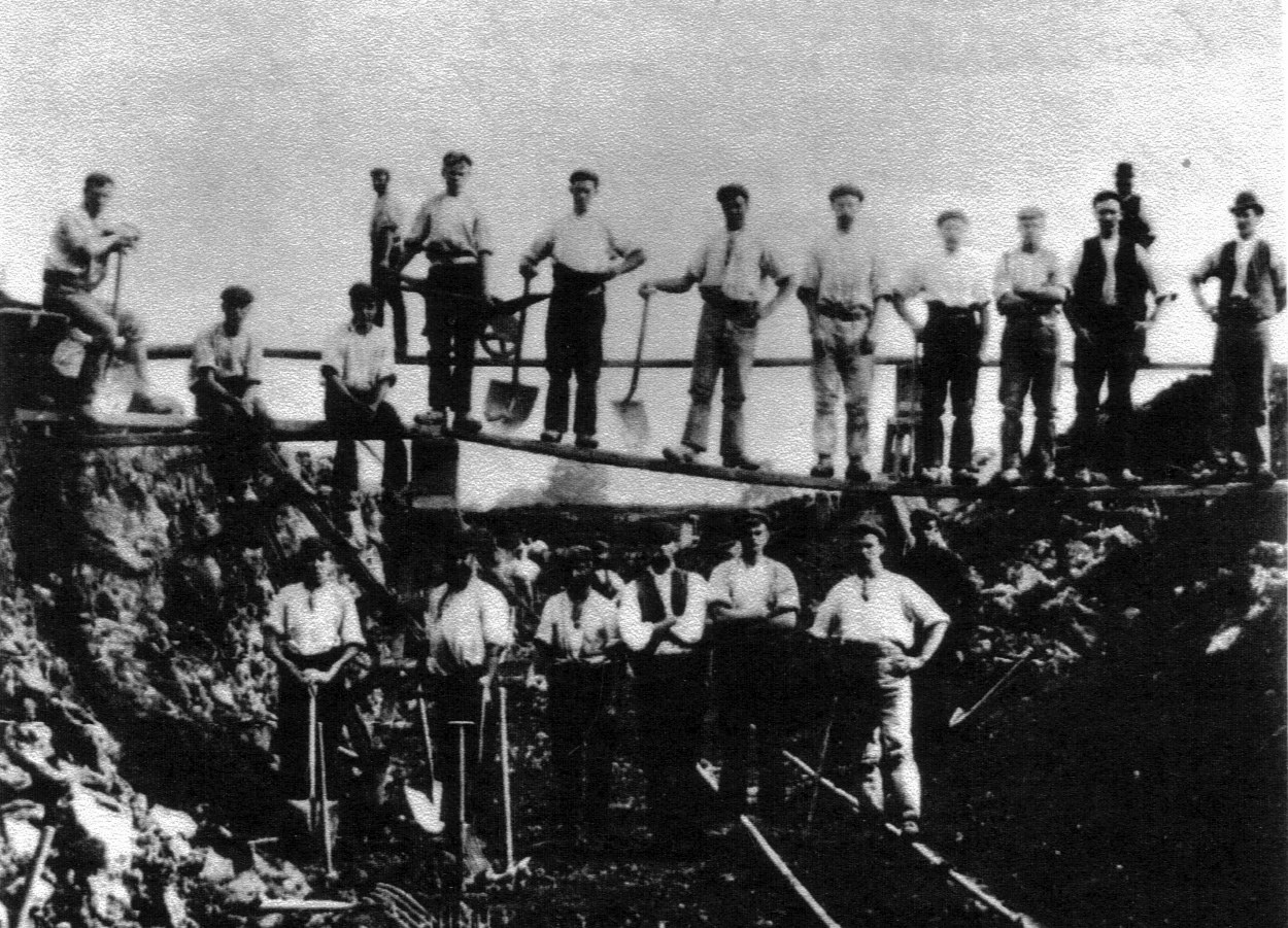 This later photograph (1930s) is at Long Hills Quarry at Weldon. You can see right at the back a man crossing the planks with a barrow.