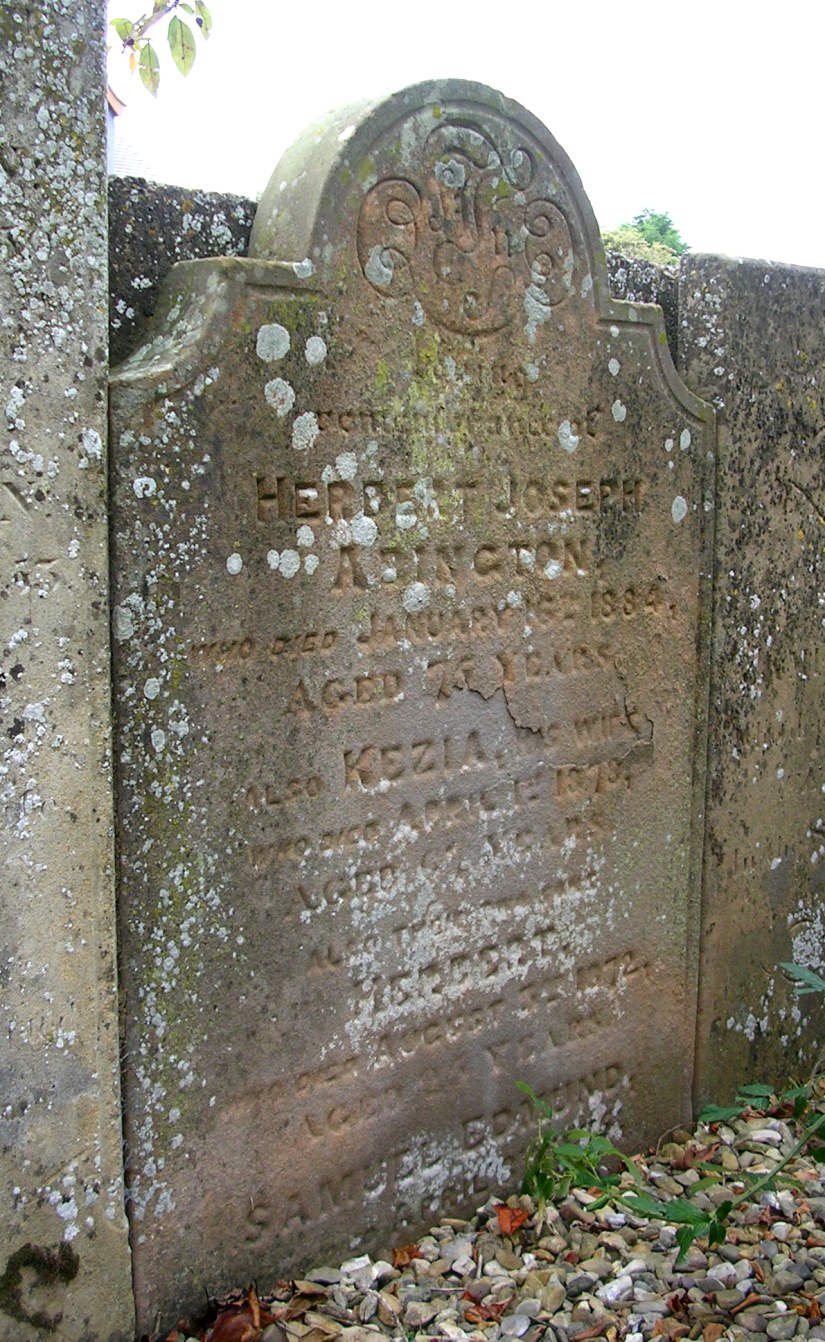 Grave of Herbert Joseph Abington and his wife Kezia and their two sons who died young). The face of the stone is slowly peeling away (Photograph: September 2011).